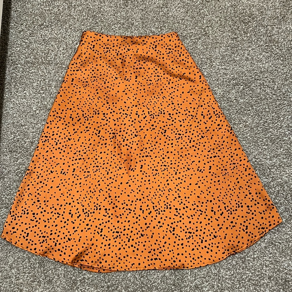SHEIN ORANGE AND BLACK PRINT midi skirt size XS